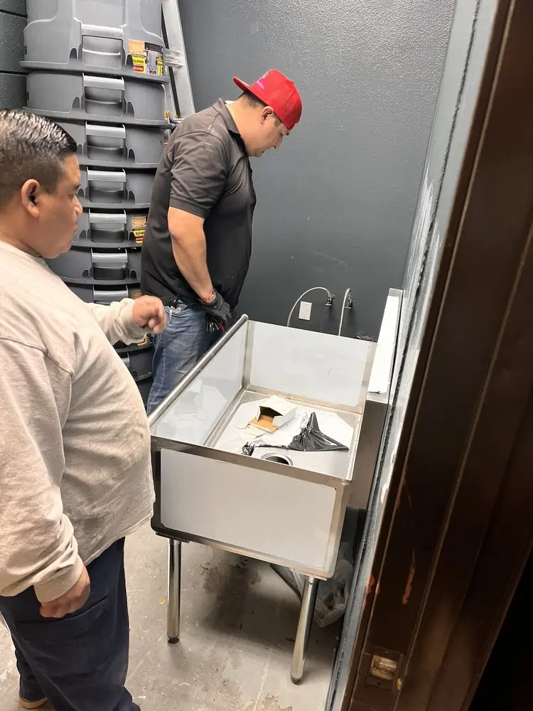 Commercial plumbing and sink installation in Waterloo